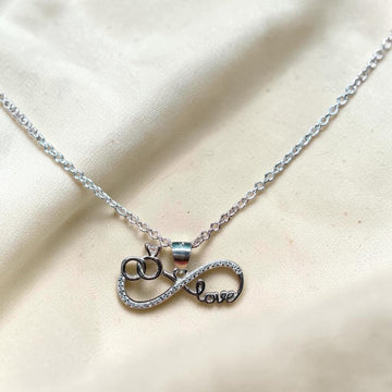 BlingbyAnvika silver infinity love pendant with cubic zirconia and interlocking rings.