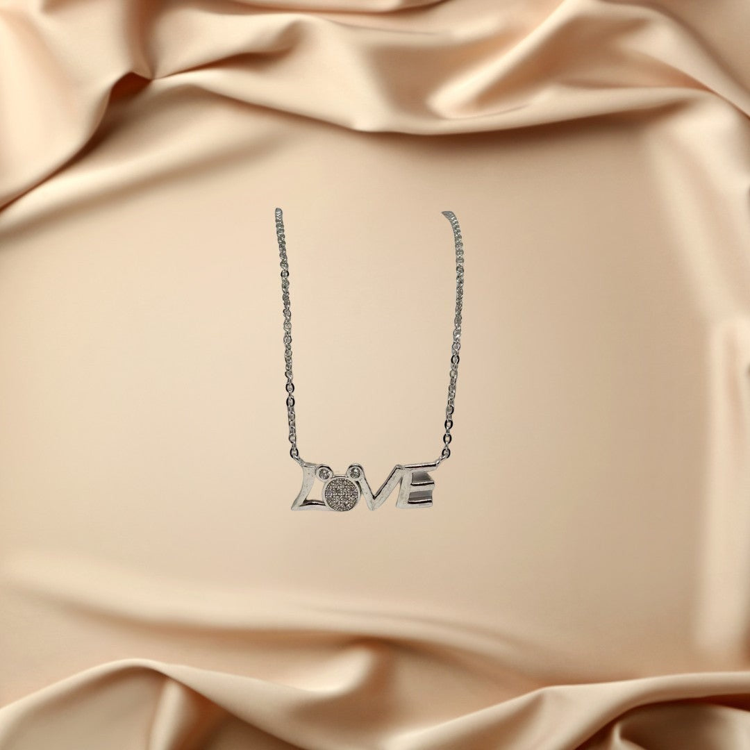 BlingbyAnvika 925 sterling silver necklace with 'LOVE' script and diamond accent.