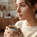 BlingbyAnvika 925 sterling silver septum ring with intricate filigree detail worn by a woman holding a coffee mug