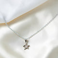 BlingbyAnvika 925 Sterling Silver Sparkling Star Pendant with cubic zirconia stones on a delicate chain.