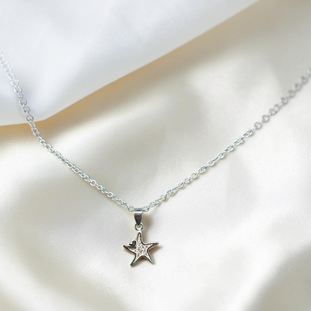 BlingbyAnvika 925 Sterling Silver Sparkling Star Pendant with cubic zirconia stones on a delicate chain.