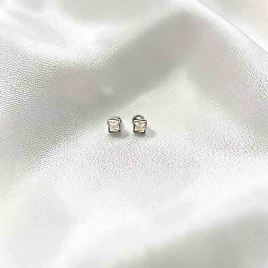 BlingbyAnvika square sterling silver stud earrings with cubic zirconia stones.
