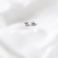 BlingbyAnvika 925 sterling silver star stud earrings with cubic zirconia stones.