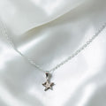 BlingbyAnvika sterling silver pendant with cubic zirconia star pendant.