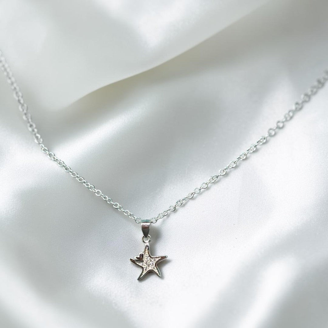 BlingbyAnvika sterling silver pendant with cubic zirconia star pendant.