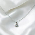 BlingbyAnvika silver-tone pendant.