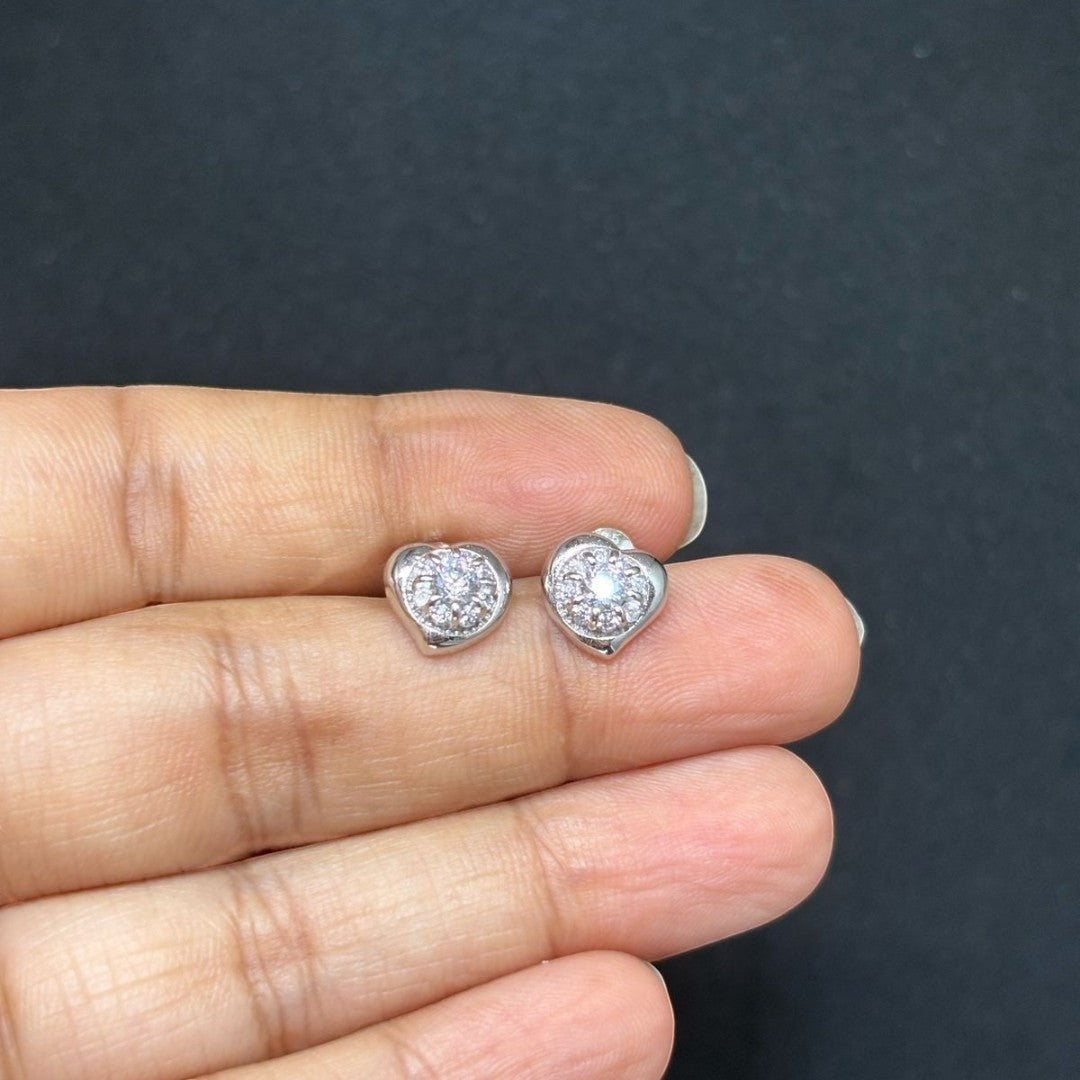 BlingbyAnvika 925 sterling silver heart-shaped stud earrings with sparkling AAA-grade zircon stones, perfect for sensitive ears.