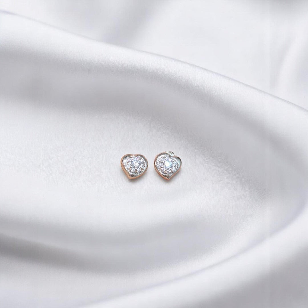 BlingbyAnvika 925 sterling silver heart-shaped stud earrings with AAA-grade zircon stones, hypoallergenic and nickel-free.