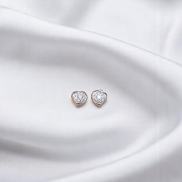 BlingbyAnvika 925 sterling silver heart-shaped stud earrings with AAA-grade zircon stones, hypoallergenic and nickel-free.