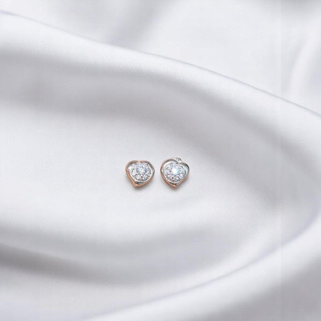BlingbyAnvika 925 sterling silver heart-shaped stud earrings with AAA-grade zircon stones, hypoallergenic and nickel-free.