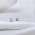 BlingbyAnvika 925 sterling silver square stud earrings with AAA-grade zircon stones and a halo of smaller stones.