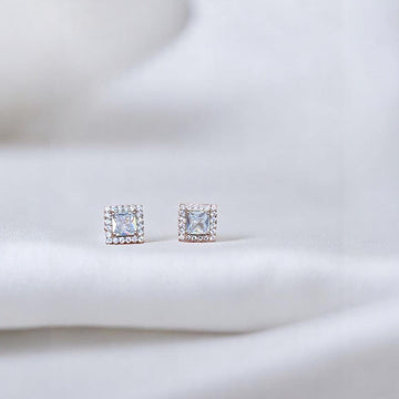 BlingbyAnvika 925 sterling silver square stud earrings with clear AAA-grade zircon stones and a halo of smaller stones.