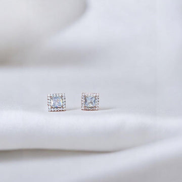 BlingbyAnvika 925 sterling silver square stud earrings with clear AAA-grade zircon stones and a halo of smaller stones.