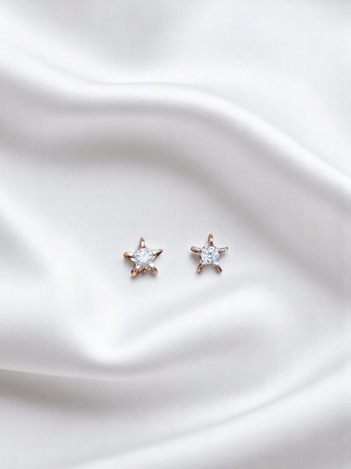 BlingbyAnvika 925 sterling silver star studs with AAA-grade zircon stones, rose gold tone, hypoallergenic.