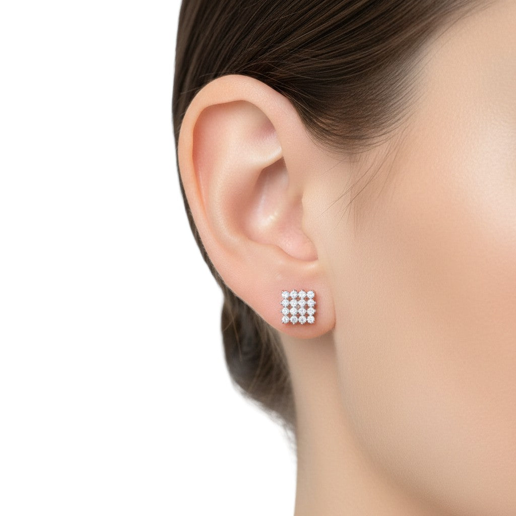 Classic 925 silver stud earrings with sparkling zircon stones for everyday elegance.