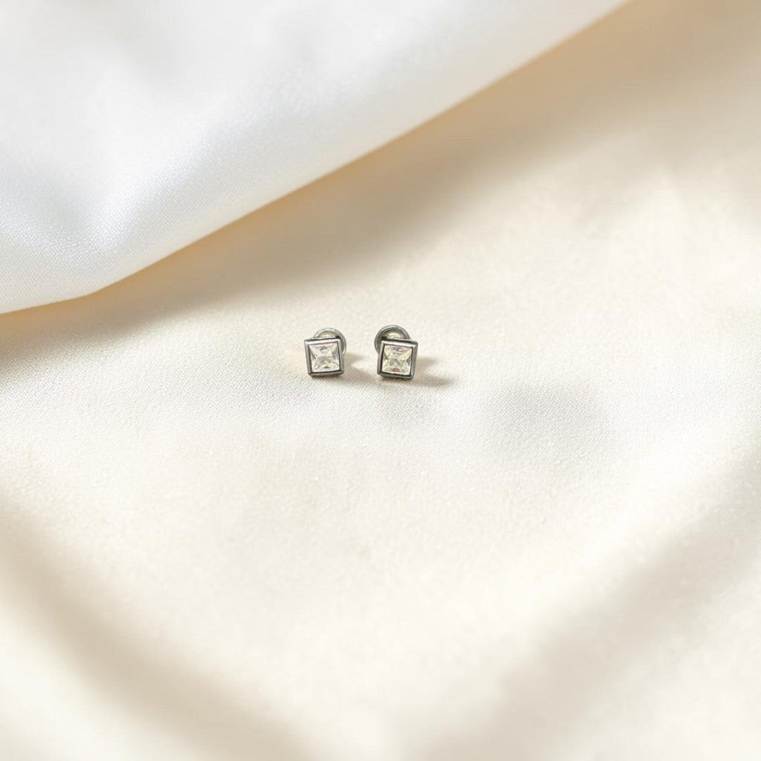 BlingbyAnvika square sterling silver stud earrings with cubic zirconia stones.