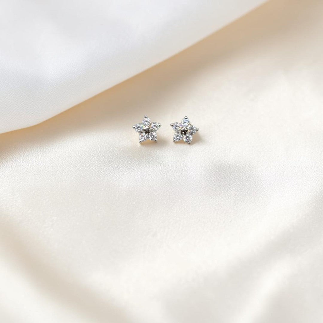 BlingbyAnvika sterling silver star stud earrings with cubic zirconia stones.