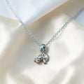 BlingbyAnvika sterling silver teddy bear charm necklace with textured paws and subtle sparkle. Delicate chain, perfect for everyday wear.