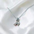 BlingbyAnvika sterling silver teddy bear charm necklace with delicate chain and textured paws.
