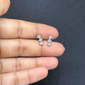 BlingbyAnvika sterling silver stud earrings featuring three sparkling AAA-grade zircon stones in a vertical design.